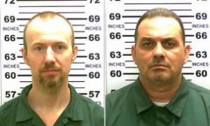 FILE - This combination of file photos released by the New York State Police shows David Sweat, left, and Richard Matt. Matt, who staged a brazen escape from an upstate maximum-security prison with Sweat and had been hunted for three weeks was shot and killed Friday, June 26, 2015, but Sweat, is still on the run. (New York State Police via AP, File)